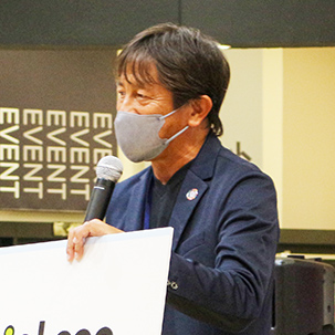 当社取締役 専務執行役員(サンメッセ総合研究所 代表)田中